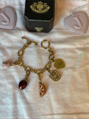 Juicy Couture Gold Charm Bracelet with strawberry and orange charms